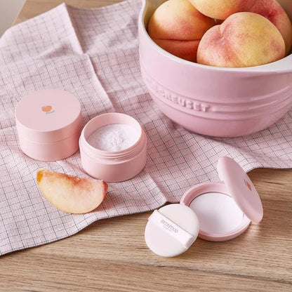 Skinfood Peach Cotton Pore Blur Pact compact held in hand