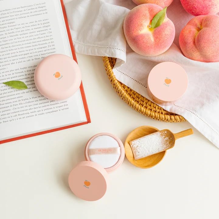 Skinfood Peach Cotton Pore Blur Pact lifestyle setting with peach elements