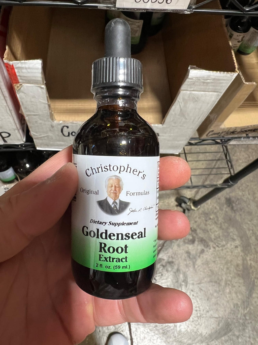 Authentic USA imported Dr. Christopher's Goldenseal Root tincture bottle on a clean backdrop