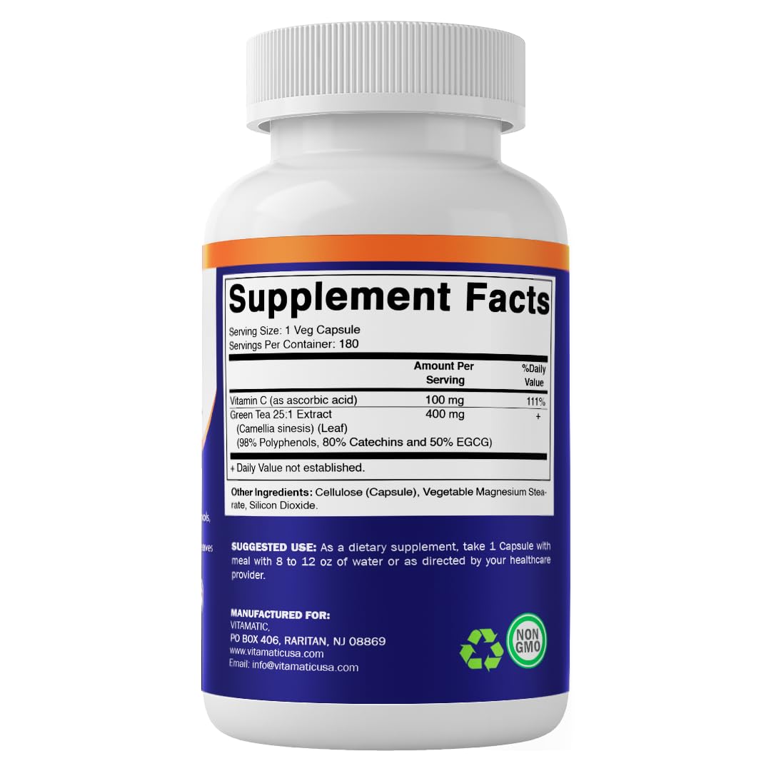 Vitamatic Green Tea Extract bottle with green tea leaves background