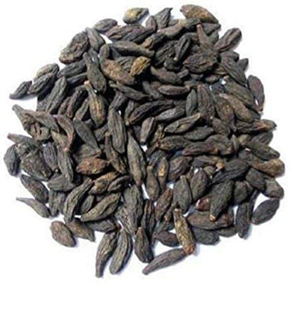Close up of Kotaliya Black Myrobalan powder texture