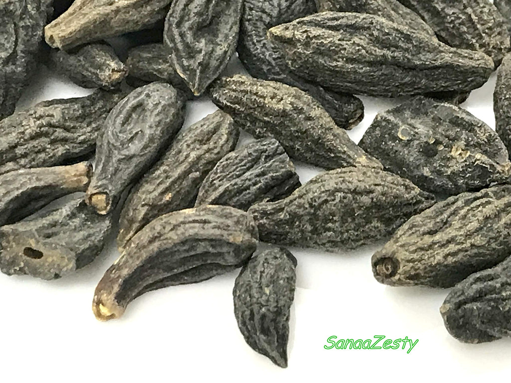 Sanaa Zesty whole Haritaki seeds displaying raw texture and quality.