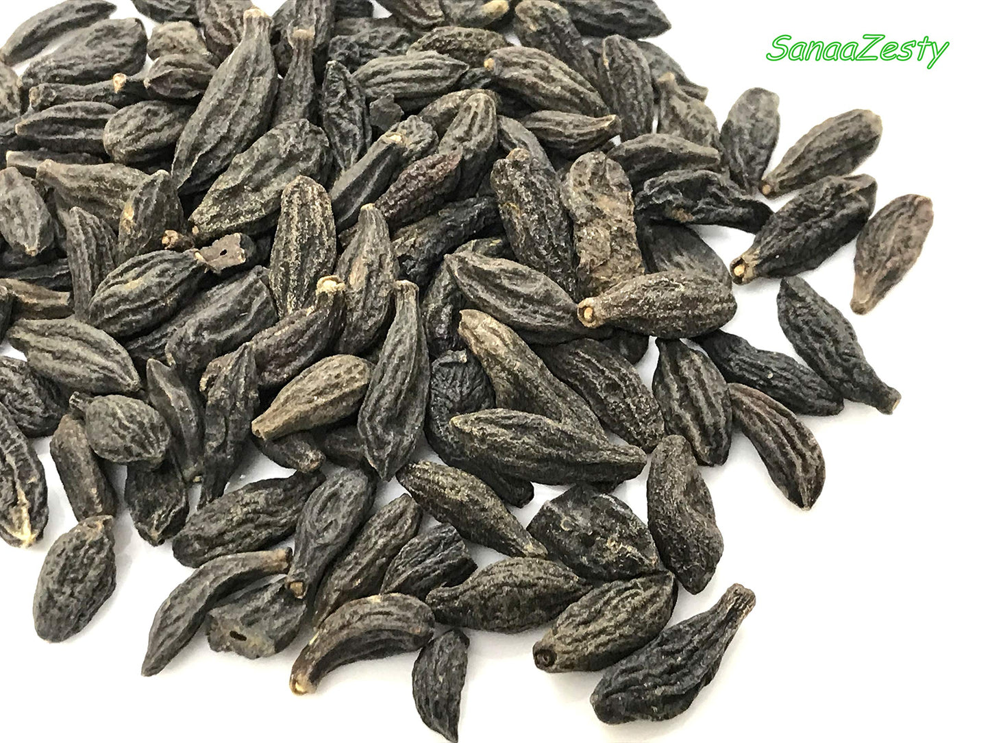 Close up of Black Himej Choti Harad dried herb by Sanaa Zesty.