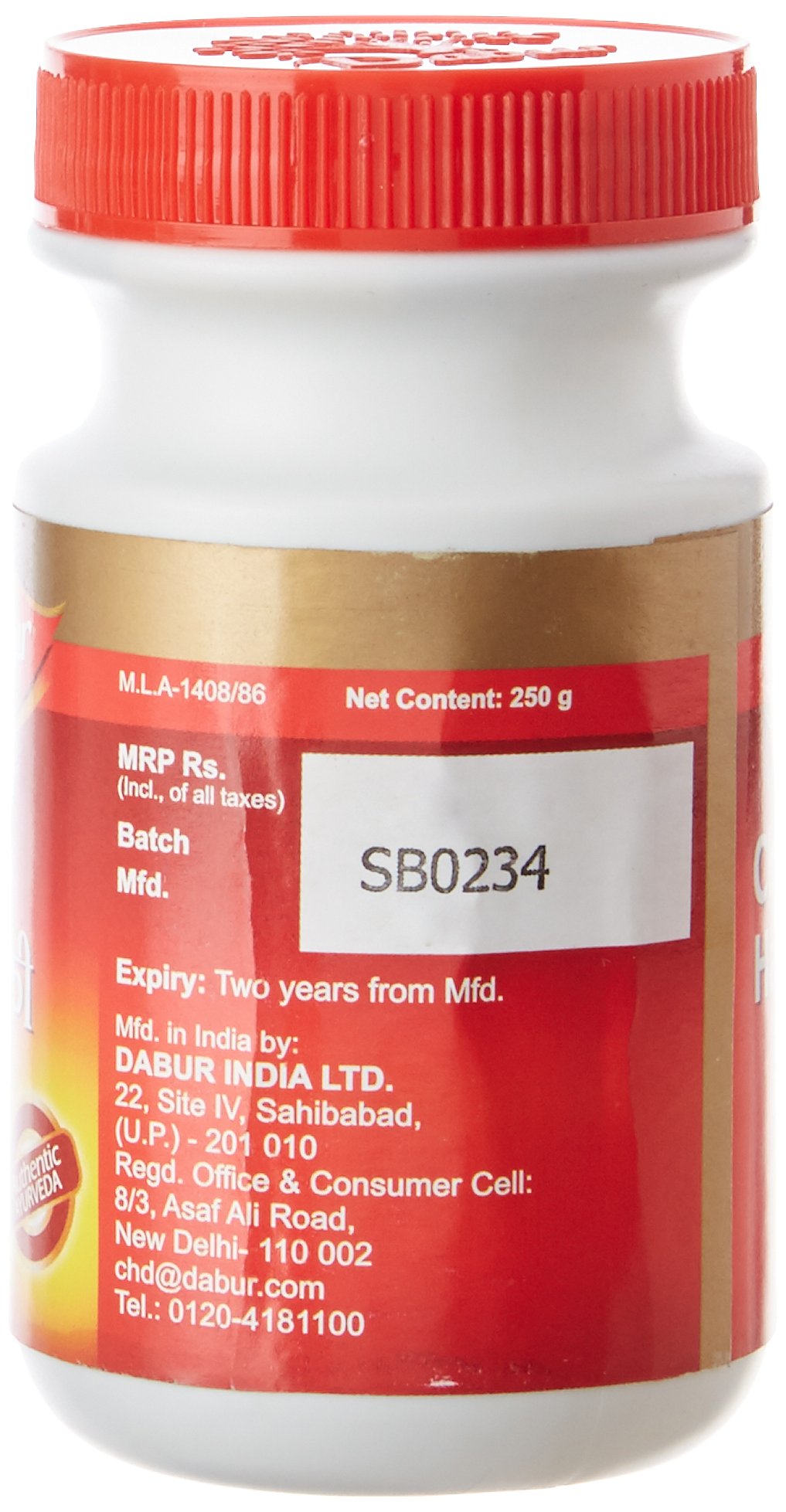 Side angle view of Dabur Chitrak Haritaki digestive supplement showing dosage guidelines and manufacturer information.