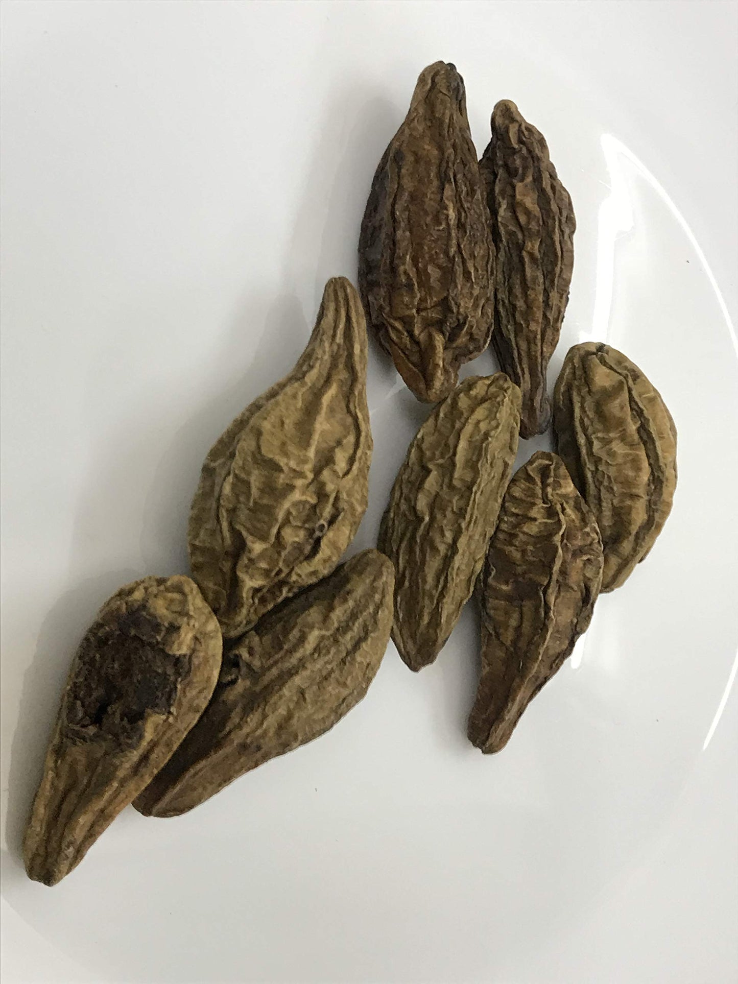 Close up view of authentic Harad whole fruit pieces highlighting natural texture.
