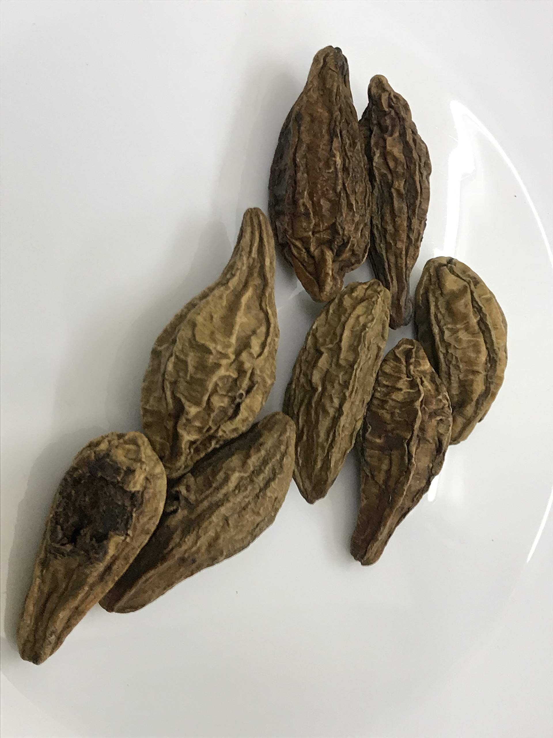Close up view of authentic Harad whole fruit pieces highlighting natural texture.