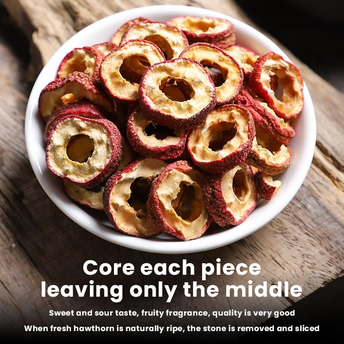 Slices of seedless dried hawthorn fruit on a wooden spoon