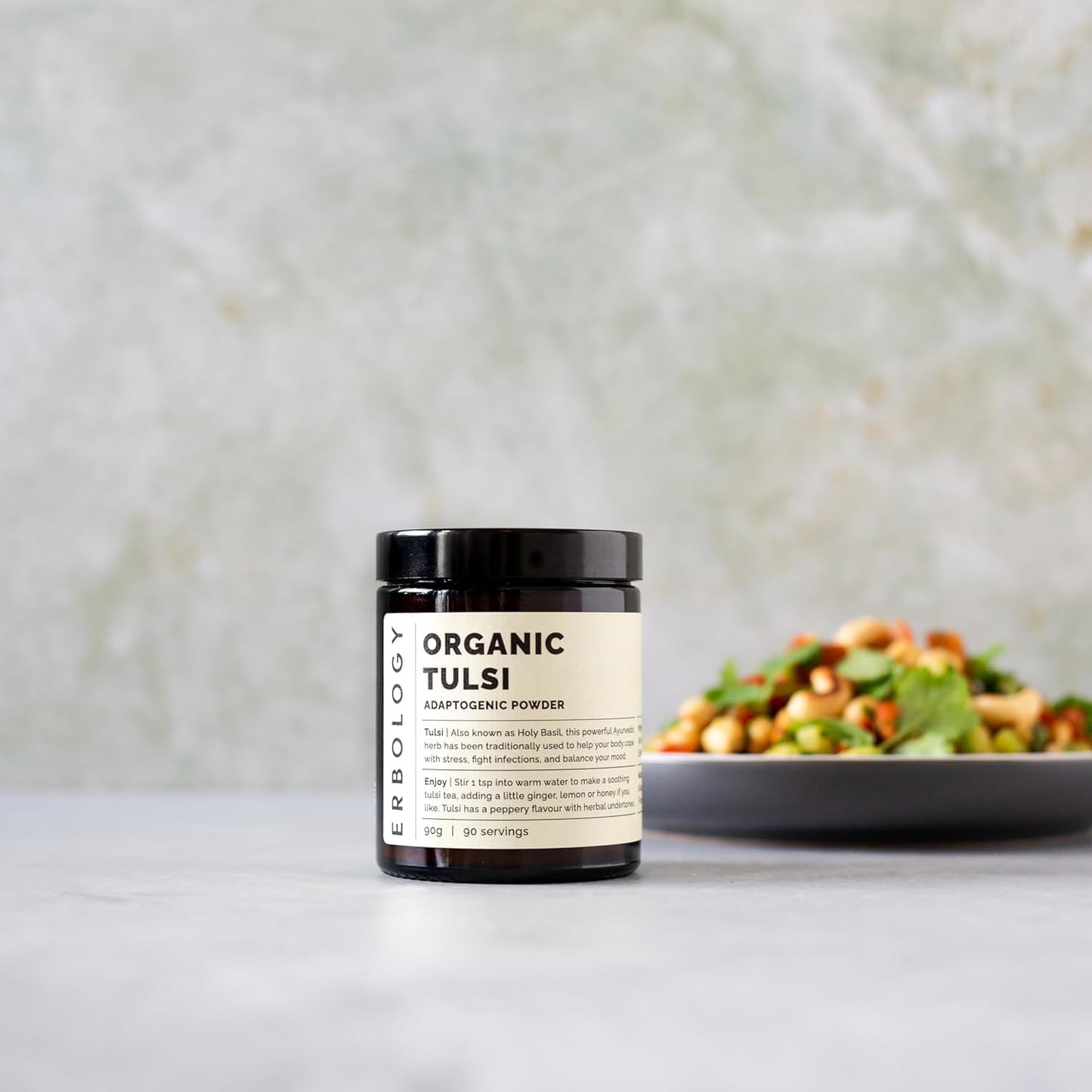 Erbology tulsi powder texture in a spoon