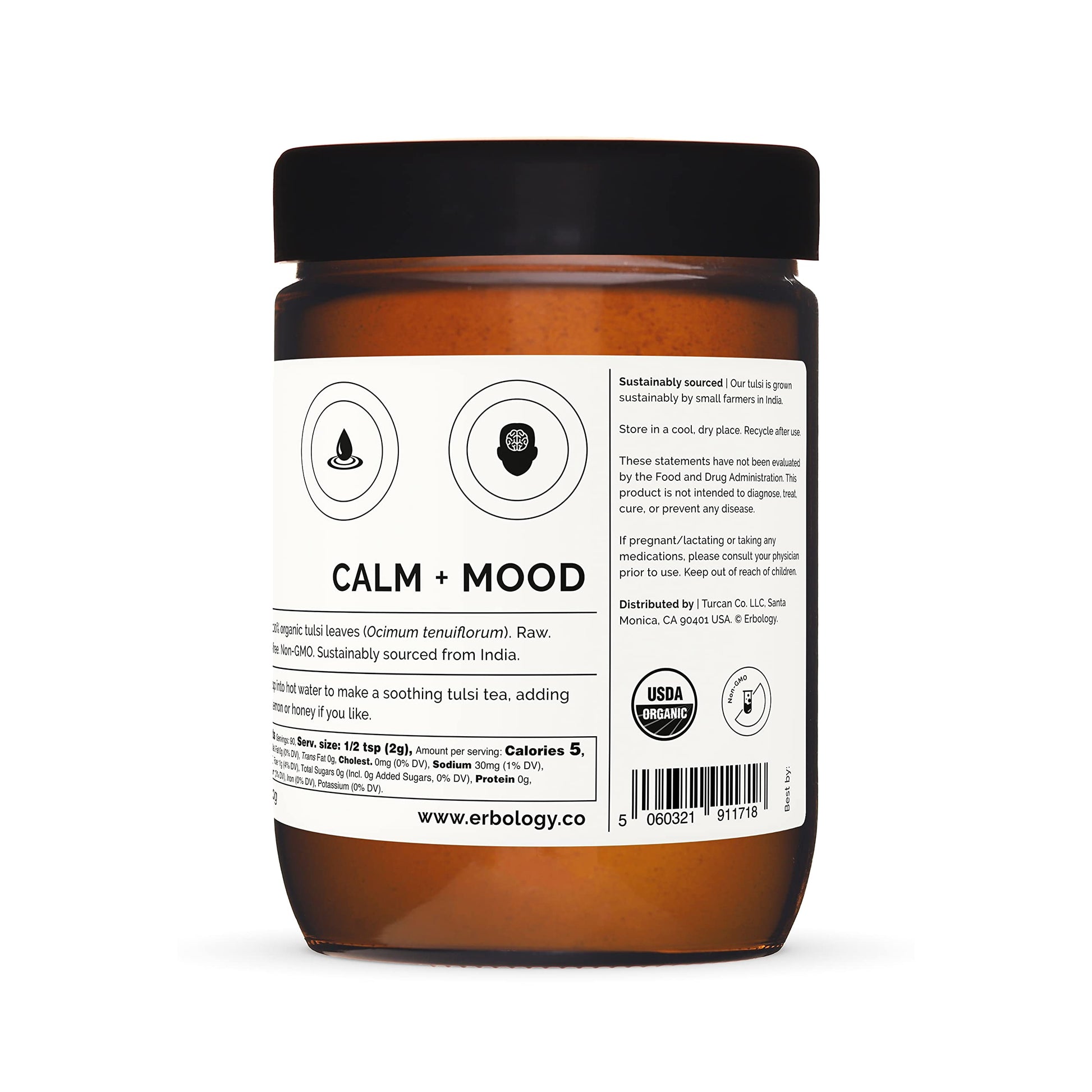 Erbology holy basil powder jar on a wooden background