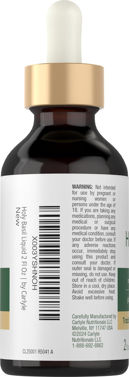 Liquid herbal tincture dropper being used for supplement dosage