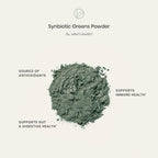Pregnancy safe daily greens formula next to a fresh fruit smoothie in a bright setting