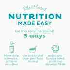 KOS certified organic spirulina supplement jar next to a fresh green smoothie