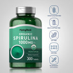 Vegetarian non-GMO certified blue-green algae superfood pills close up