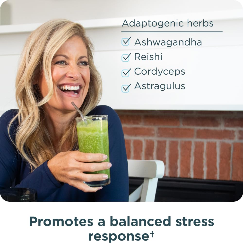 Ancient Nutrition wellness supplement scoop next to water glass