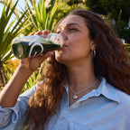 Athletic Greens AG1 wellness pouch highlighting vegan keto and gluten free certifications