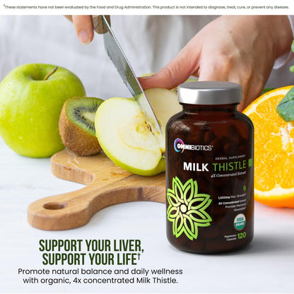 OmniBiotics non-GMO soy-free milk thistle herbal capsules poured on a surface