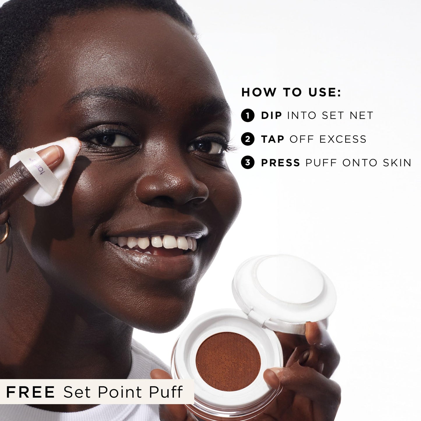 Tarte Creaseless Setting Powder texture close up showcasing fine milled formula