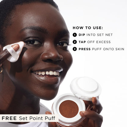 Tarte Creaseless Setting Powder texture close up showcasing fine milled formula