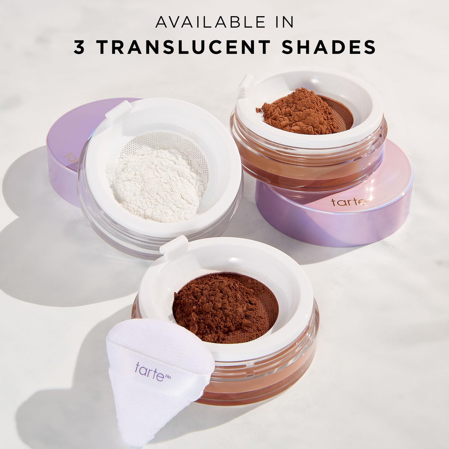 Tarte longwear vegan setting powder under puff application demonstration angle