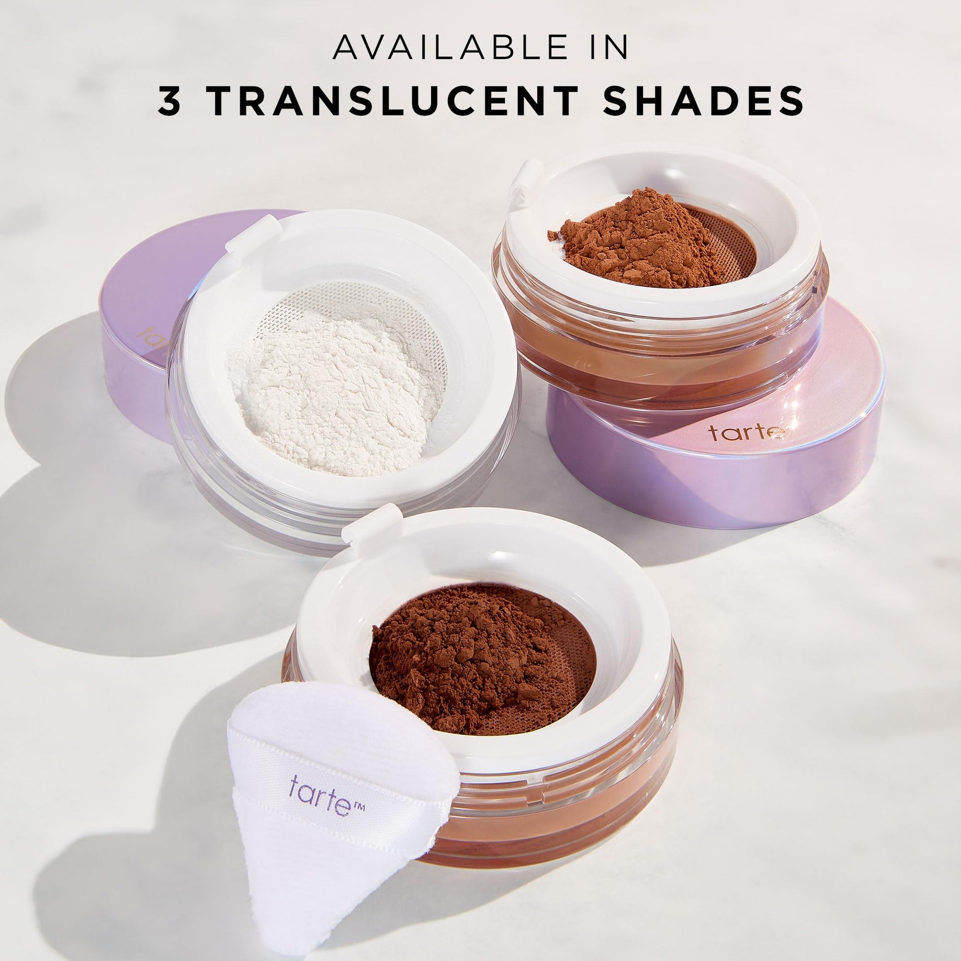 Tarte longwear vegan setting powder under puff application demonstration angle