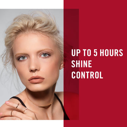 Application of Rimmel London matte powder with brush