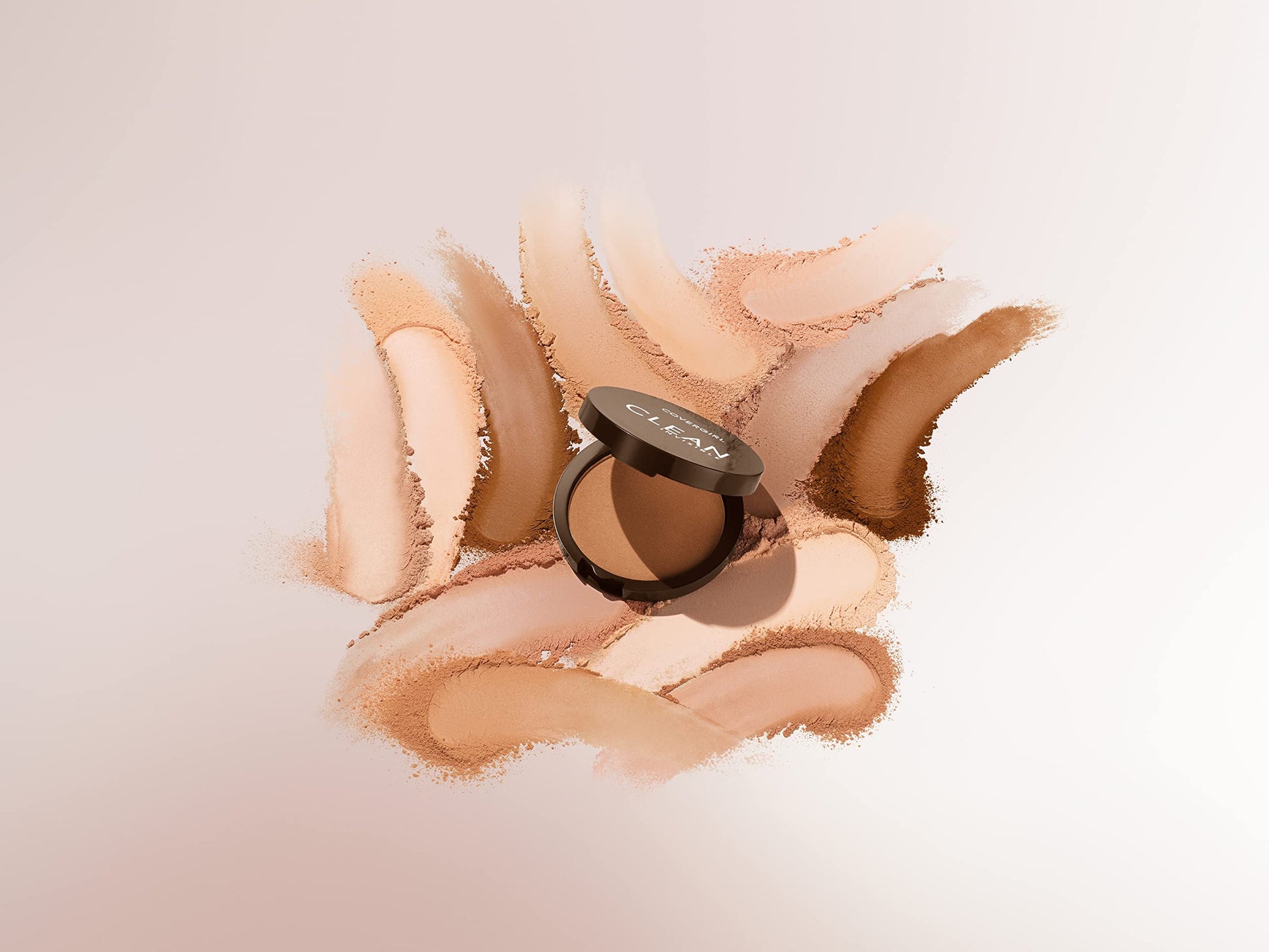 Covergirl Creamy Natural 120 powder shade swatch on skin