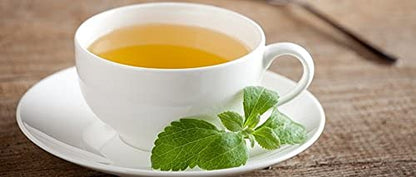 Clear hot herbal tea infusion brewed using authentic Nature Tea stevia leaves.