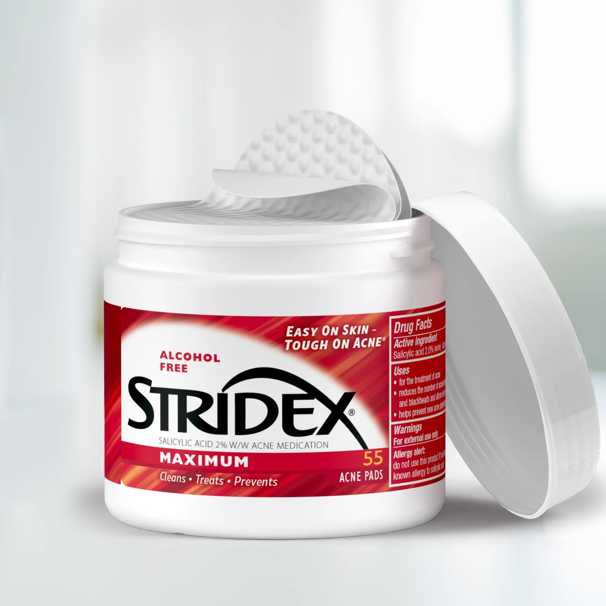 Stridex medicated pads open jar showing textured wipes