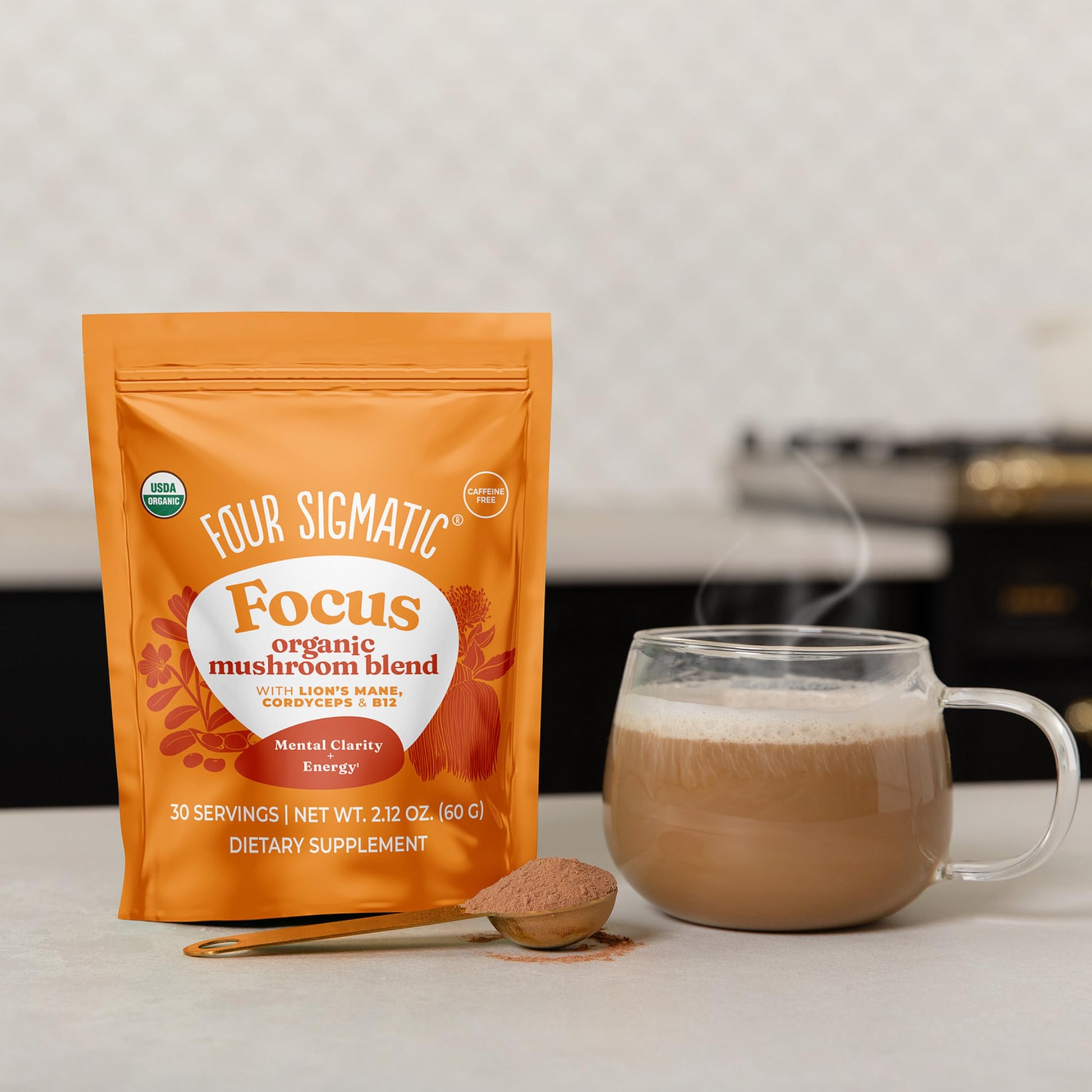 Four Sigmatic Focus Blend superfood powder scoop texture close up view.