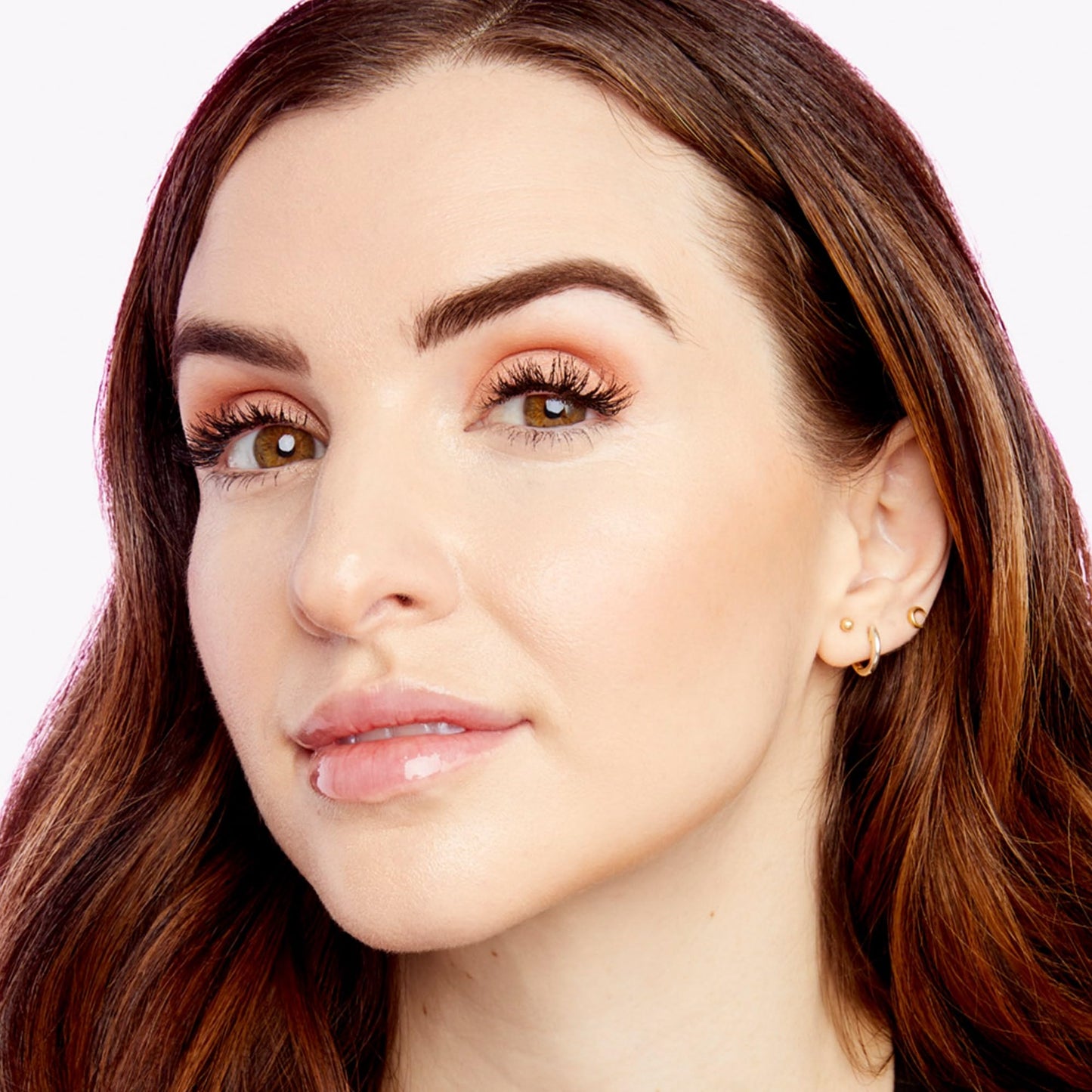 Tarte hydrating sheer foundation alternative squeeze tube on clean background