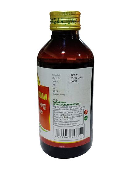 Two hundred milliliter bottle of Nagarjuna Balaashwagandhaadi massage oil highlighting key herbal ingredients and directions.