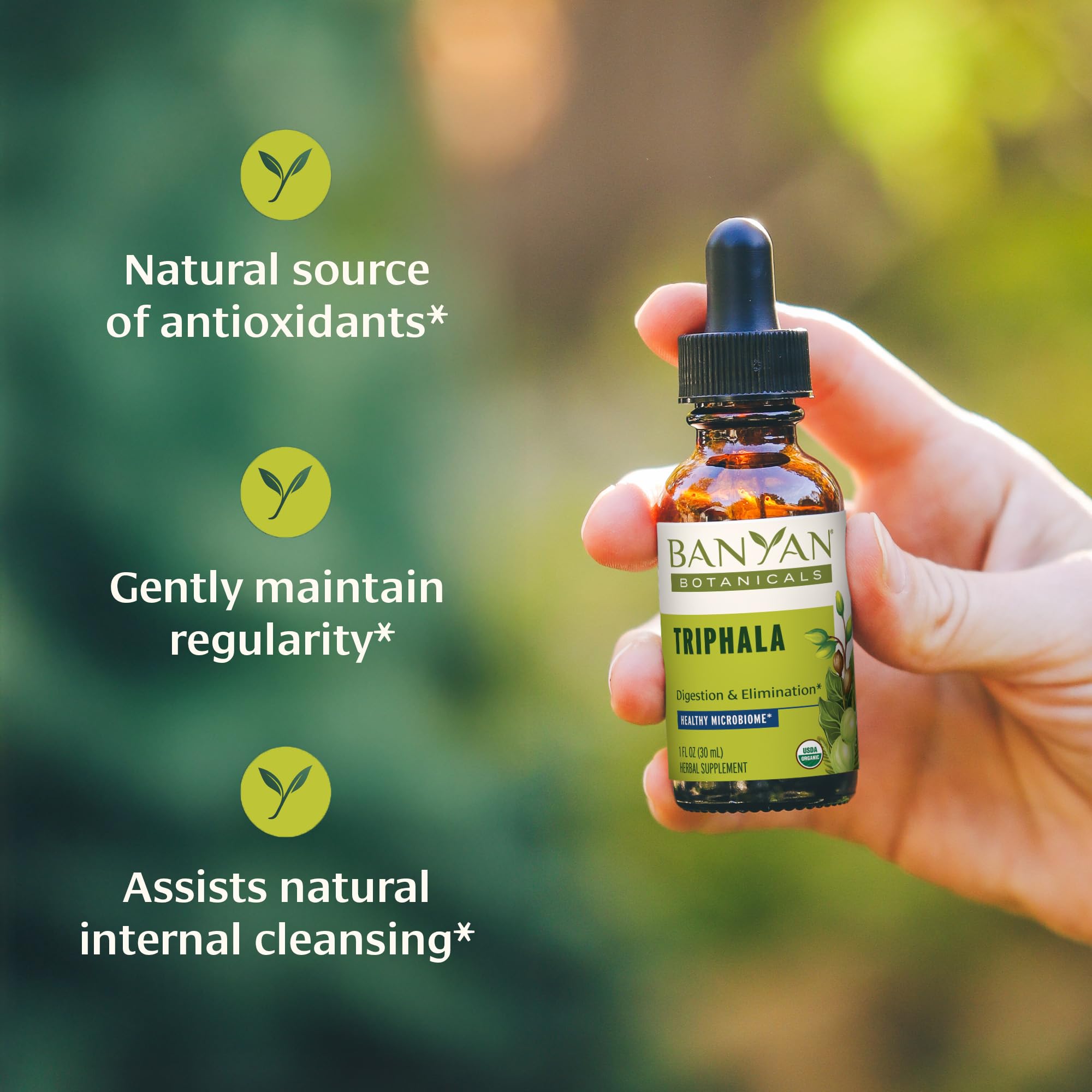 Banyan Botanicals Triphala liquid herbal extract dropper bottle showing organic ingredients