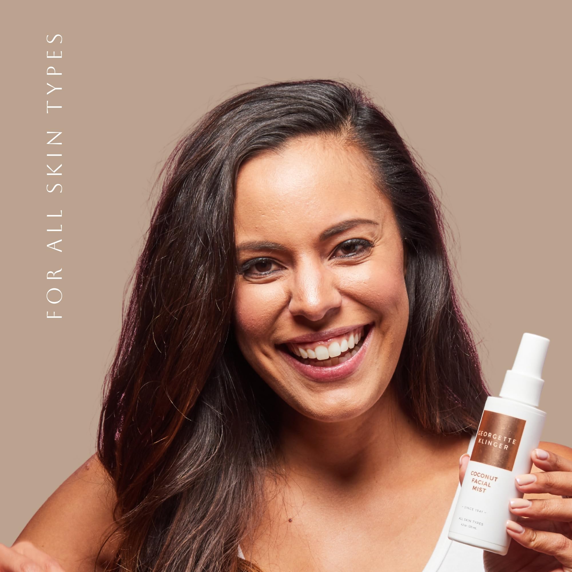 Georgette Klinger makeup setting spray bottle angled view on clean background