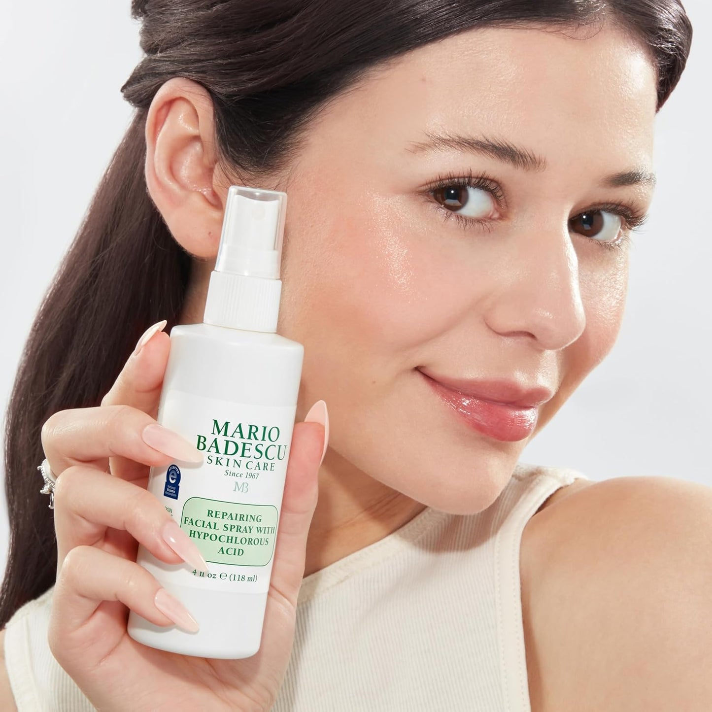 Lifestyle shot of Mario Badescu facial spray for sensitive skin