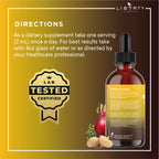 An explicit macro shot of the Liberty Lifestyle vitality supplement liquid being measured out with its glass dropper.
