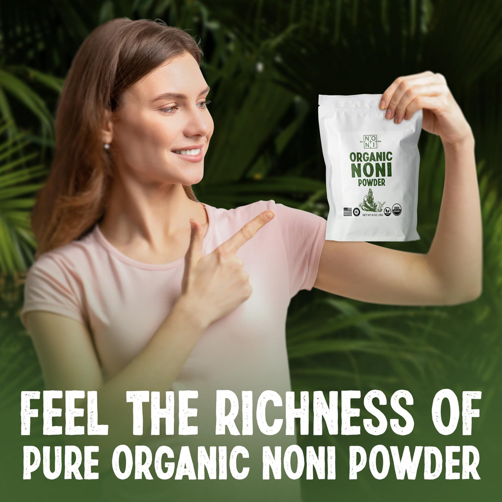 Healing Noni supplement packaging displayed next to a fresh breakfast smoothie to showcase daily wellness usage options.