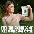 Healing Noni supplement packaging displayed next to a fresh breakfast smoothie to showcase daily wellness usage options.