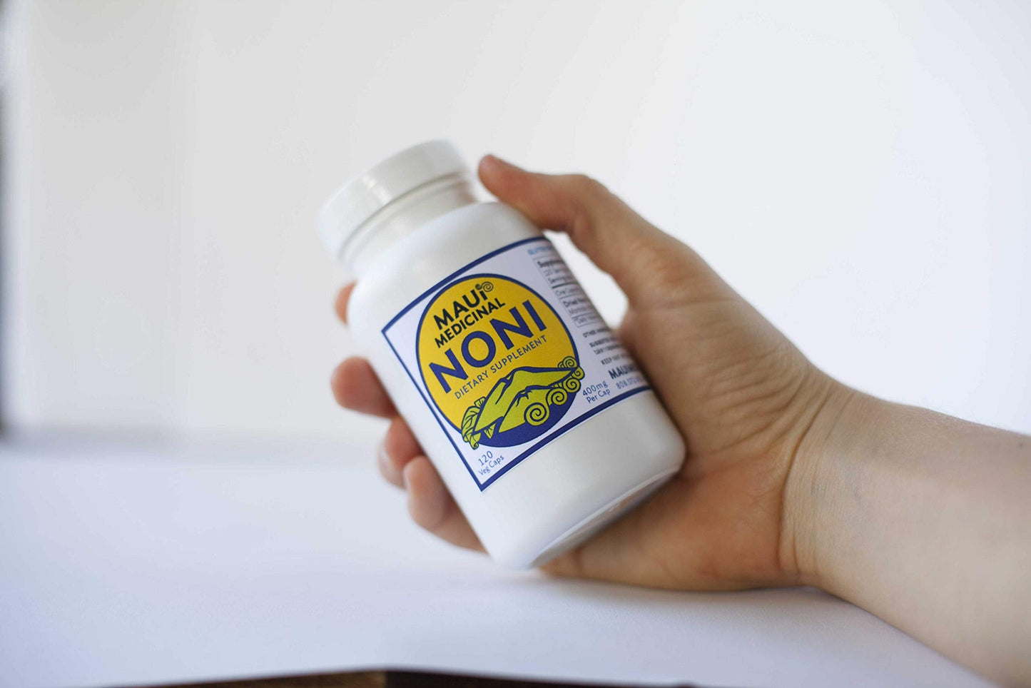 Two bottles of organic noni vegetarian capsules by Maui Medicinal Herbs for natural antioxidant boost