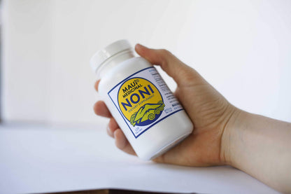 Two bottles of organic noni vegetarian capsules by Maui Medicinal Herbs for natural antioxidant boost