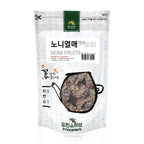 Dried Morinda Citrifolia bulk slices showing the organic texture and rich dark color of the imported superfruit.