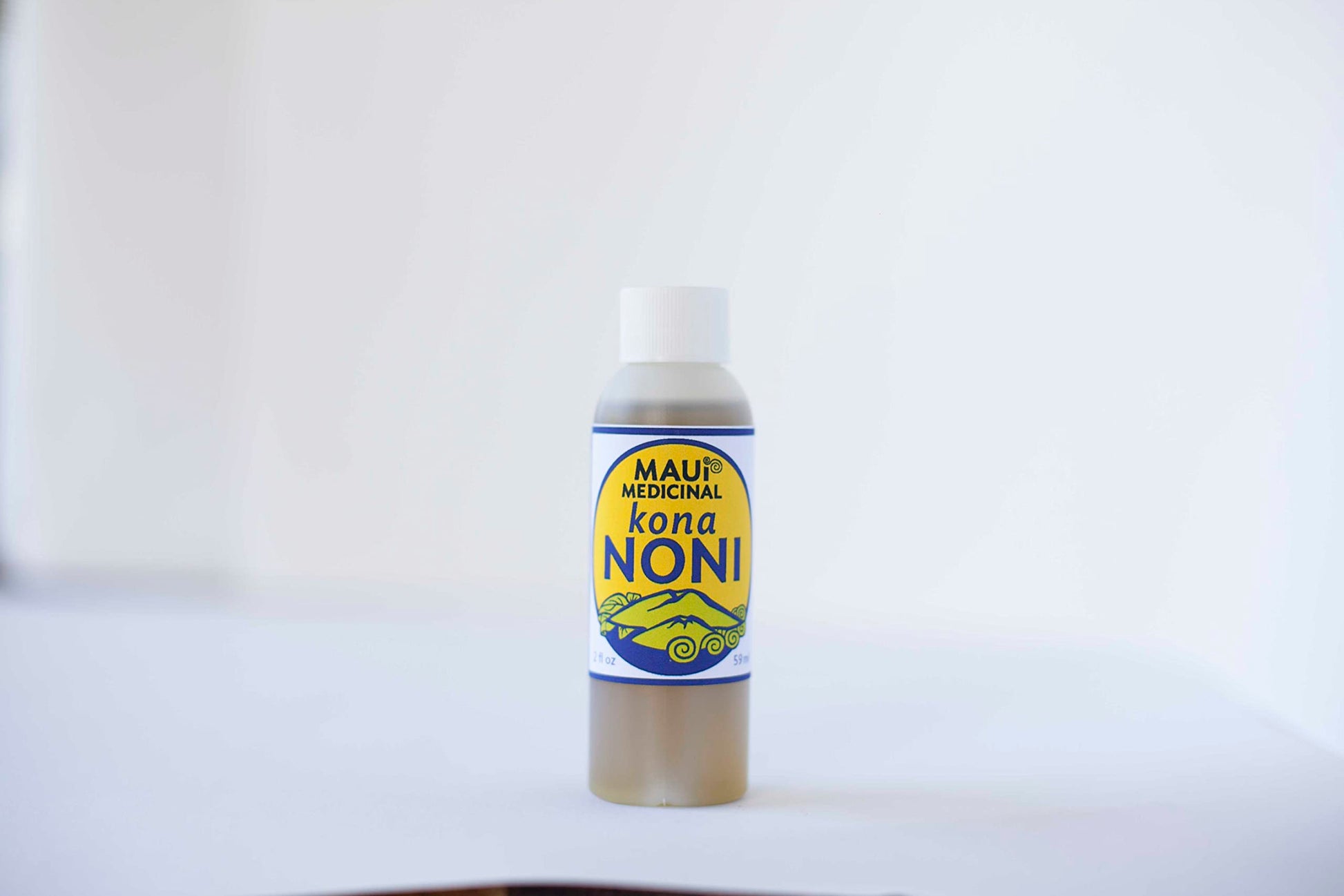 Two ounce bottle of certified organic Hawaiian noni leaf body oil