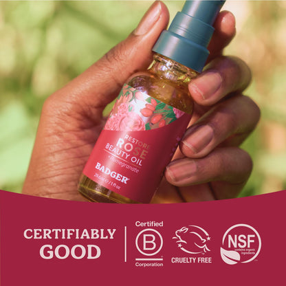Badger Rose Face Oil being dispensed to demonstrate the fast absorbing non greasy formula