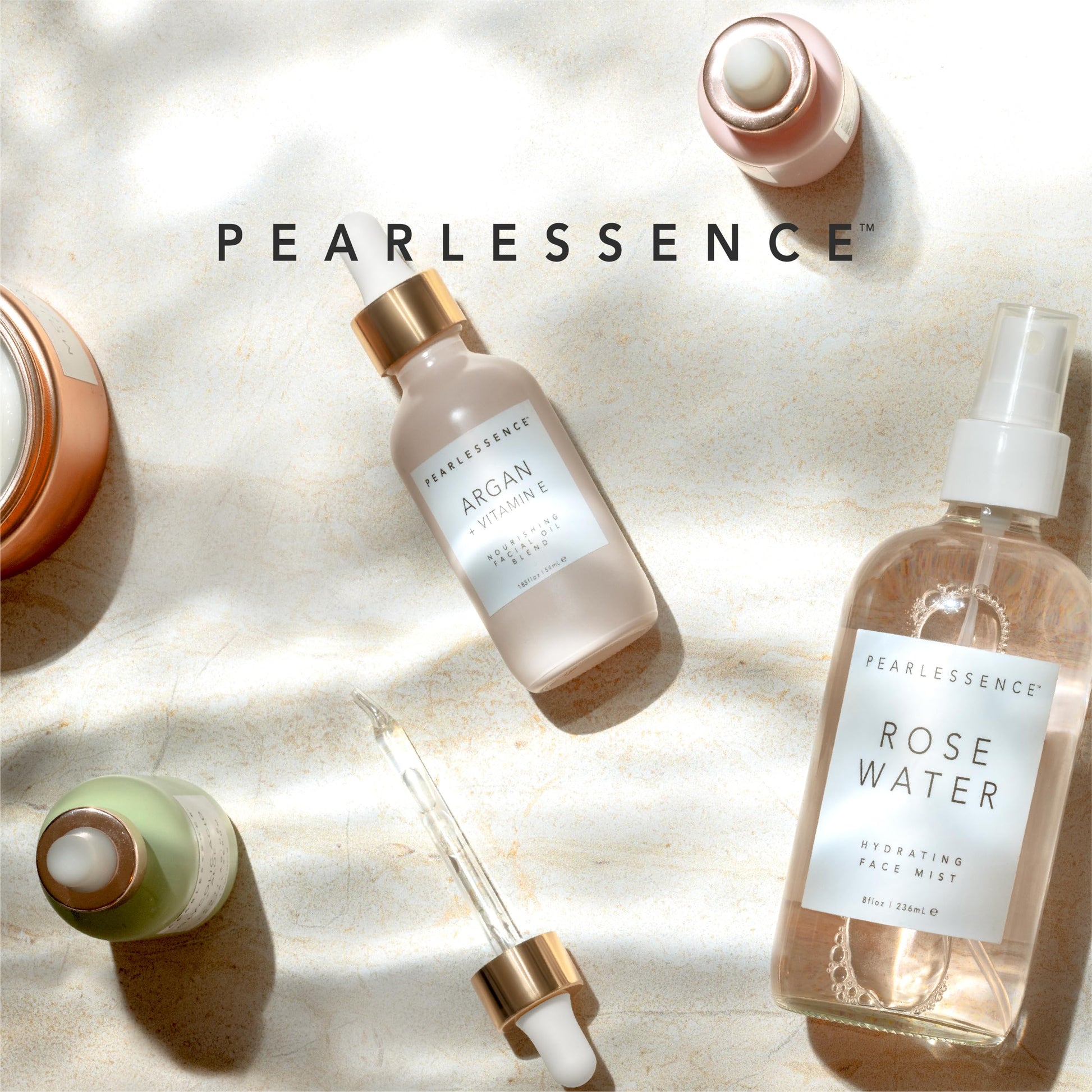 Pearlessence pink bottle facial oil showcasing ingredients for skin elasticity