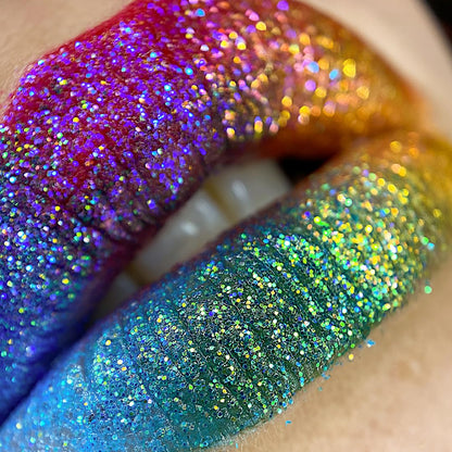 Model applying Unicorn Snot Lip Glitter Primer