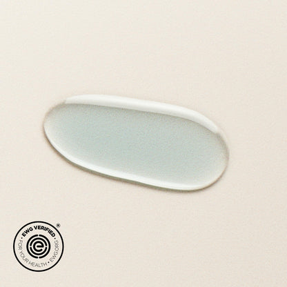 DIME Beauty Blue Facial Oil side angle of the 30 mL luxury skincare bottle