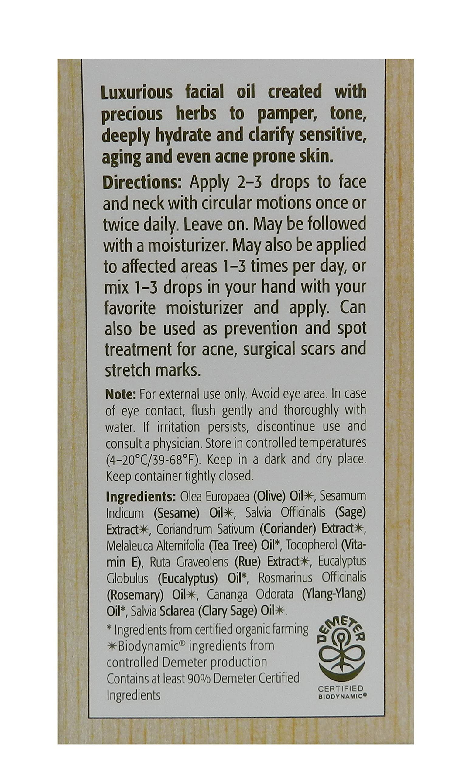 Eminence Facial Recovery Oil application drops on fingertips for skincare routine