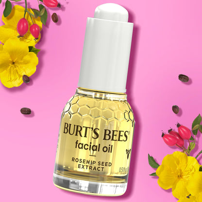 Burt's Bees facial oil being paired with a gua sha tool