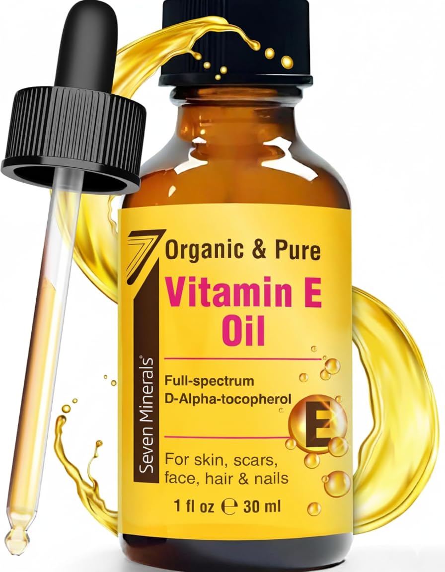 Applying pure organic vitamin E oil for face wrinkles and hydration
