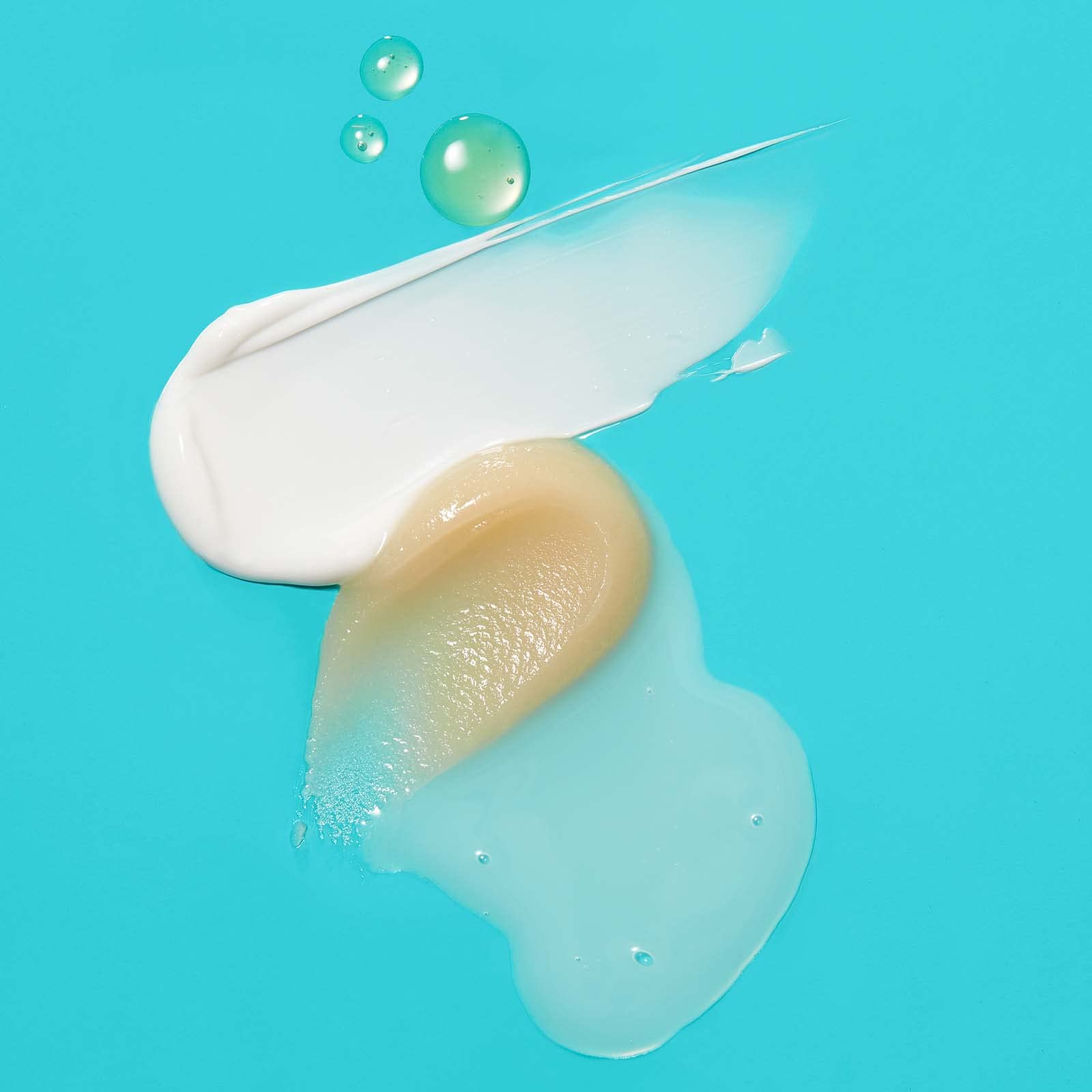 TULA Hydrating Day and Night Cream and Vitamin C Serum bottles side by side