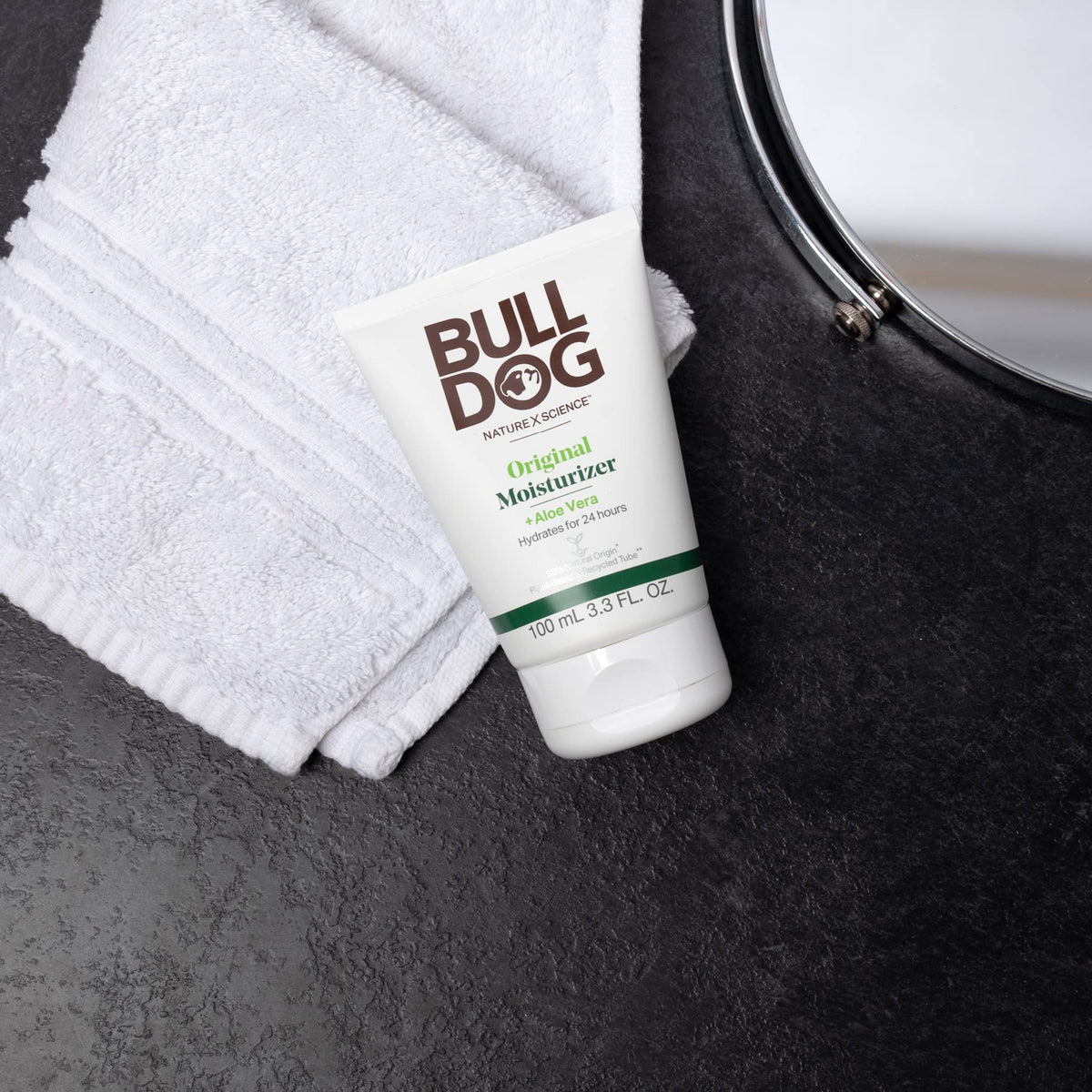 Side angle view of Bulldog men grooming kit bottles and tubes